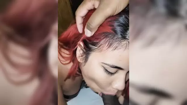 Redheaded Mexican woman with a tattoo sucks cock before sex in a crouch position